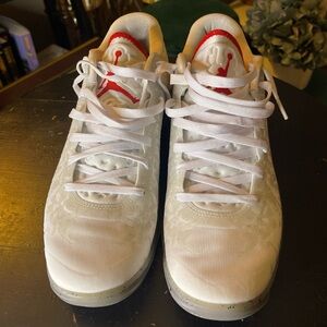 Nike White Jordan Sneakers with Red Jumpman Accent